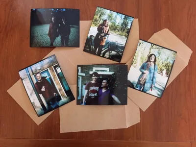 Five images floating in my bath. RA4 paper development needs to be warm, or there will be color casts.